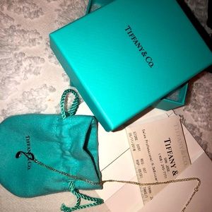 Tiffany & Co.
Picasso Graffiti MUSIC note Necklace